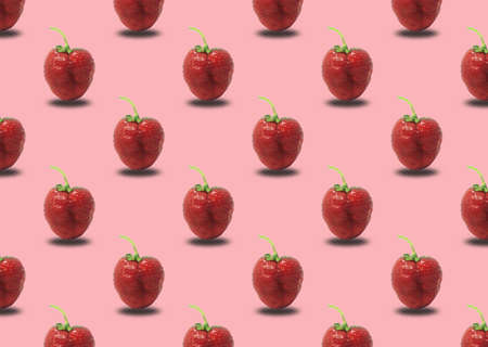 Strawberries on a pink background. Seamless pattern with ripe red strawberries.の写真素材