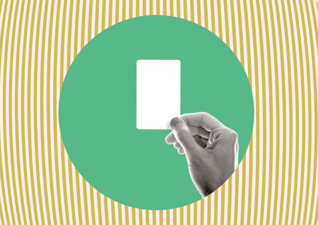 The hand holds a mock-up of a credit card, business cards. art collage.の写真素材