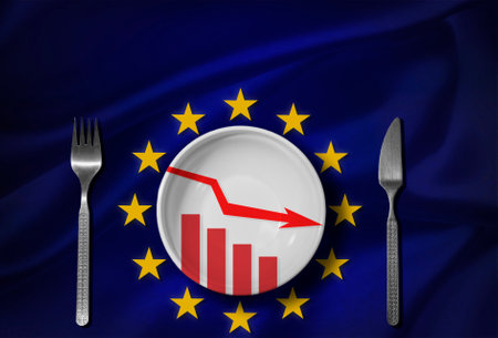 An empty plate with a graph of losses against the background of the EU flag. Global crisis, food supply problem. Conceptual message, starvation and famine issue. Hunger diet conceptの写真素材