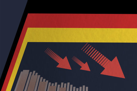 German flag on the background of financial charts. Economic crisis in Germanyの写真素材