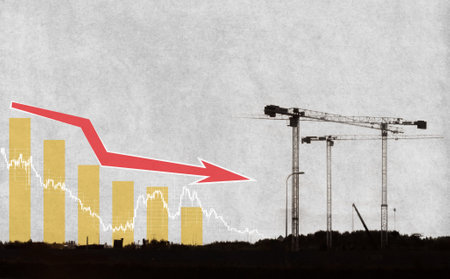 modern art collage. Construction cranes on the background of the loss graph. The concept of a crisis in construction.の写真素材