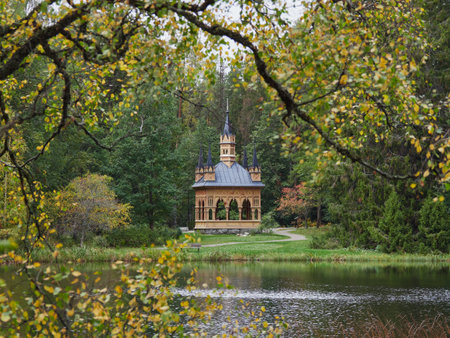 View of neogothic style pavilion near lake in Europe.の写真素材