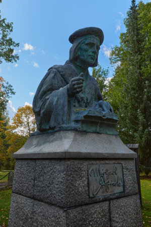 Finland, Loviisa - September 29, 2024. Memorial bust of Mikael Agricola in the Finnish town of Loviisa, where he was baptized.のeditorial素材