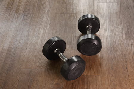 Dumbbells on the floor in the gymの写真素材