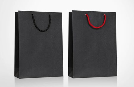 Black Cardboard Bag with handle rope, Isolated on white backgroundの写真素材