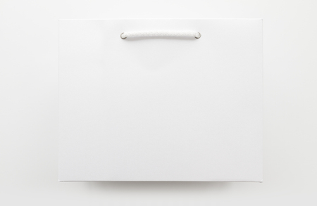 White Paper Bag with handle rope, Isolated on white backgroundの写真素材