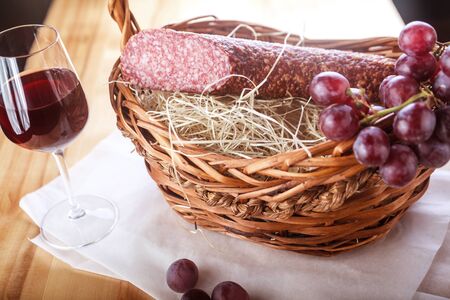 Lunch salad with grilled sausage and fresh vegetables.の写真素材