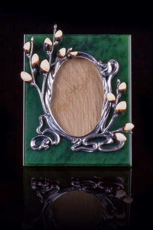 Dark wooden picture frame isolated on white background.の写真素材