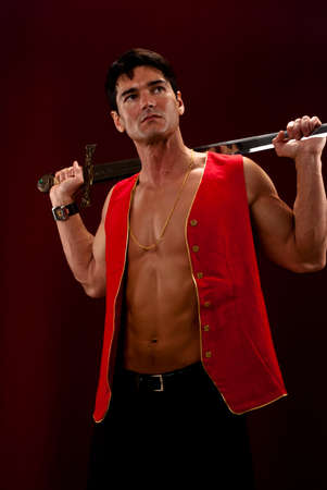 The hot pirate poses for the photo.