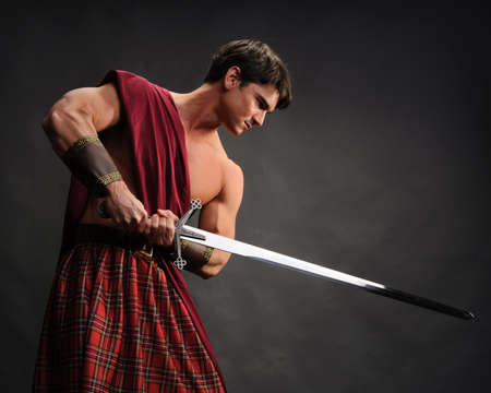 The sexy highlander poses for the photo.の写真素材
