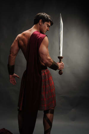The handsome highlander poses for the photo.