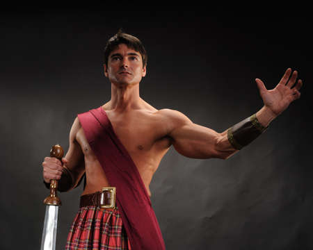 The handsome highlander poses for the photo.