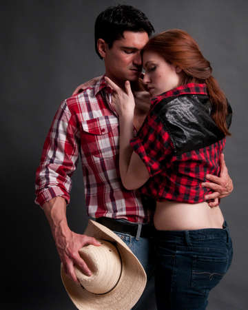 The sexy couple pose for the photo.の写真素材