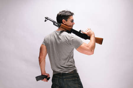 The sexy sniper poses for the photo.の写真素材