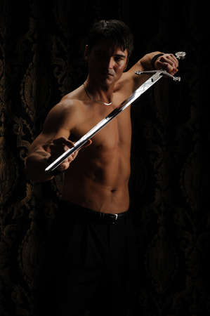 The sexy barbarian poses for the photo.