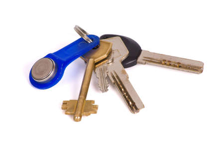 Bunch of keys from three metal keys and one electronic key isolated on white ths