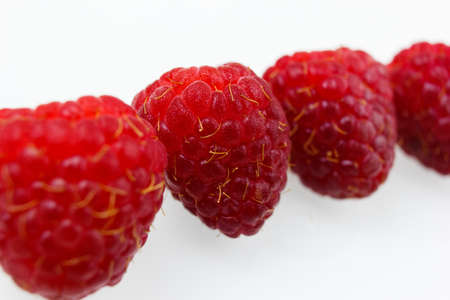 raspberries on white background