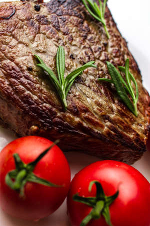grilled steak with vegetables close upの写真素材