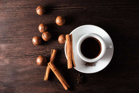 cup of coffee and cinnamon sticksの写真素材
