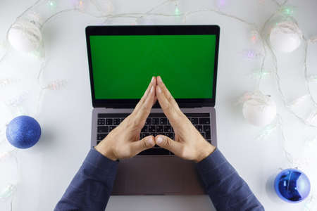 working on a laptop on new year's eve