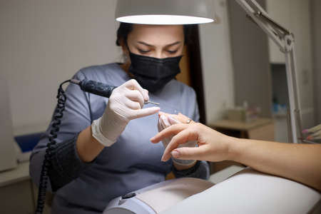 The master makes the client a hardware manicure. The manicurist polishes the client's nails and...