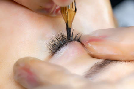 cotton swabs remove excess pigment from the eyelashes and