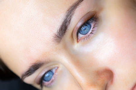 cotton swabs remove excess pigment from the eyelashes and