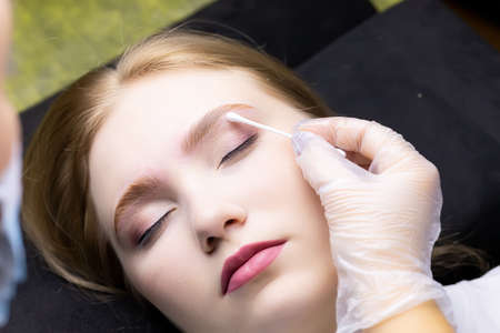 close-up of the models' eyebrows before the eyebrow lamination procedureの写真素材