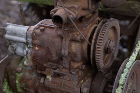 rusty non-working motor in the yardの写真素材