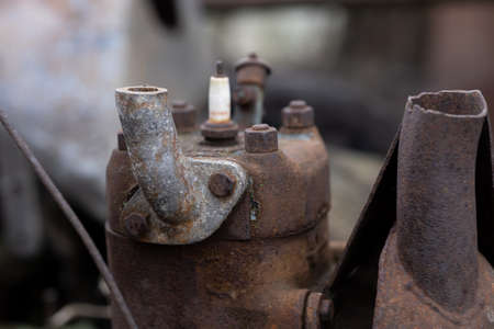 rusty non-working motor in the yardの写真素材
