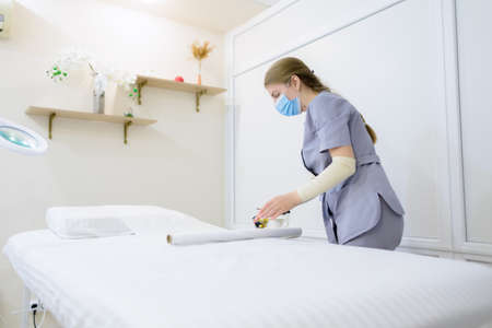 preparation of the workplace of the master of electrolysis for the procedure of permanent hair removalの写真素材
