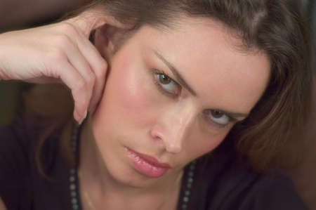 Pretty woman looking strait at you. Head portrait