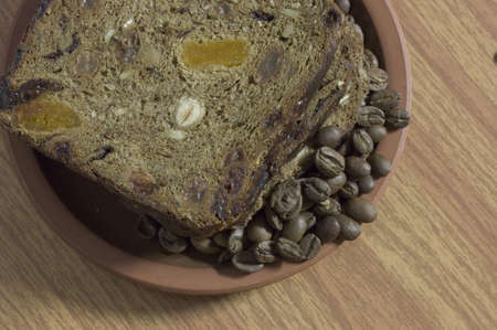 Morning snack with toastes and coffee beansの写真素材