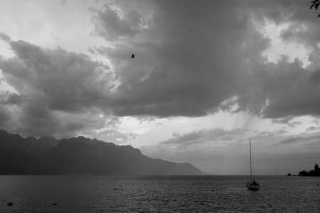Small yacht on Lake Genevaの写真素材