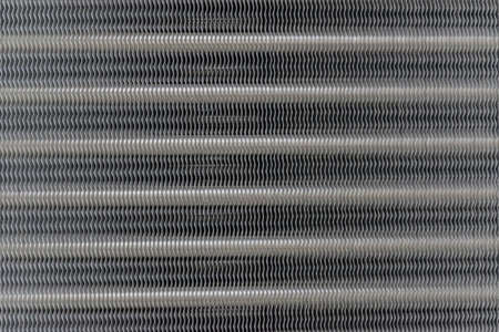 Heat exchanger. Texture of industrial cooling unit water-to-air heat exchanger fragment.の写真素材