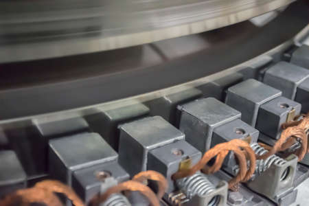 Hydro generator static excitation system. Carbon brushes in brush holders and slip rings of the...