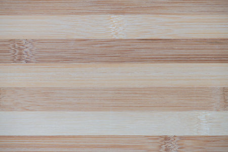 Surface of flat bamboo board composed of alternating planks of light and dark tones, pattern,...