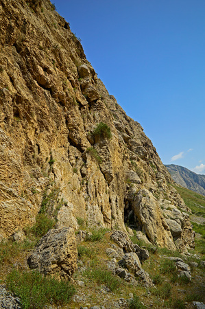 Rocky mountains near Jidalik lake, Kadamzhay area, Kyrgyzstan Rocky mountains near Jidalik lake, Kadamzhay area, Kyrgyzstan