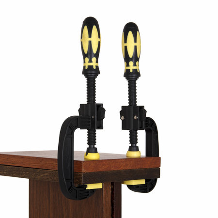 clamps of yellow color hold two wooden bars on a white background. Use F-clamp to holding or catch wood in woodworking.の写真素材