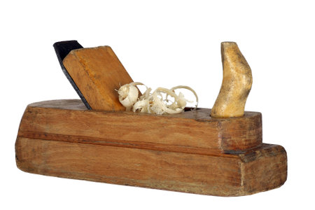 vintage planer on a white background. for wood processing. with shavings. carpenter planed wood.の写真素材