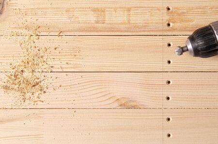 countersink bit in the drill holes machined countersink in wooden workpieces. furniture manufacturingの写真素材