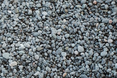 background of pebbles on the beachの写真素材