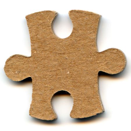 one piece of a puzzle isolated on a white backgroundの写真素材