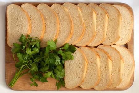 cutting bread on a board