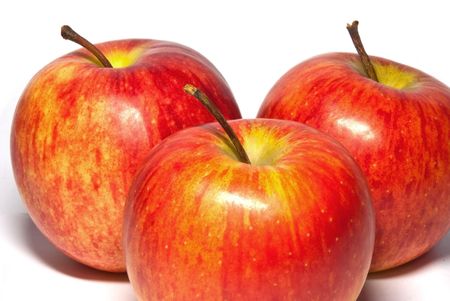 three apples isolated on a white backgroundの写真素材