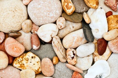 background of pebbles on a beachの写真素材