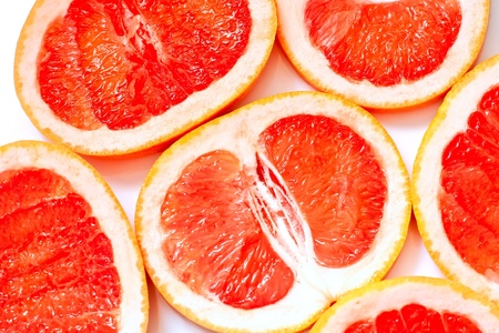 background made of sliced grapefruitの写真素材
