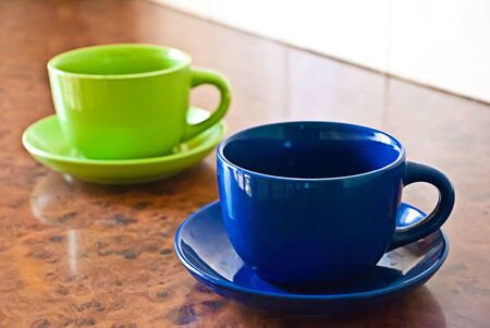 two empty cups on a tableの写真素材