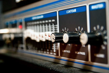 amplifier equipment with knobs and sliders