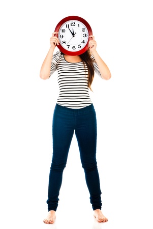 young woman with clock isolated on a white backgroundの写真素材